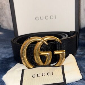 Authentic black Gucci belt w gold double GG buckle .